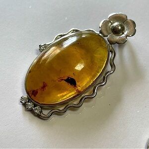 Elegant Sterling Silver and Amber Pendant